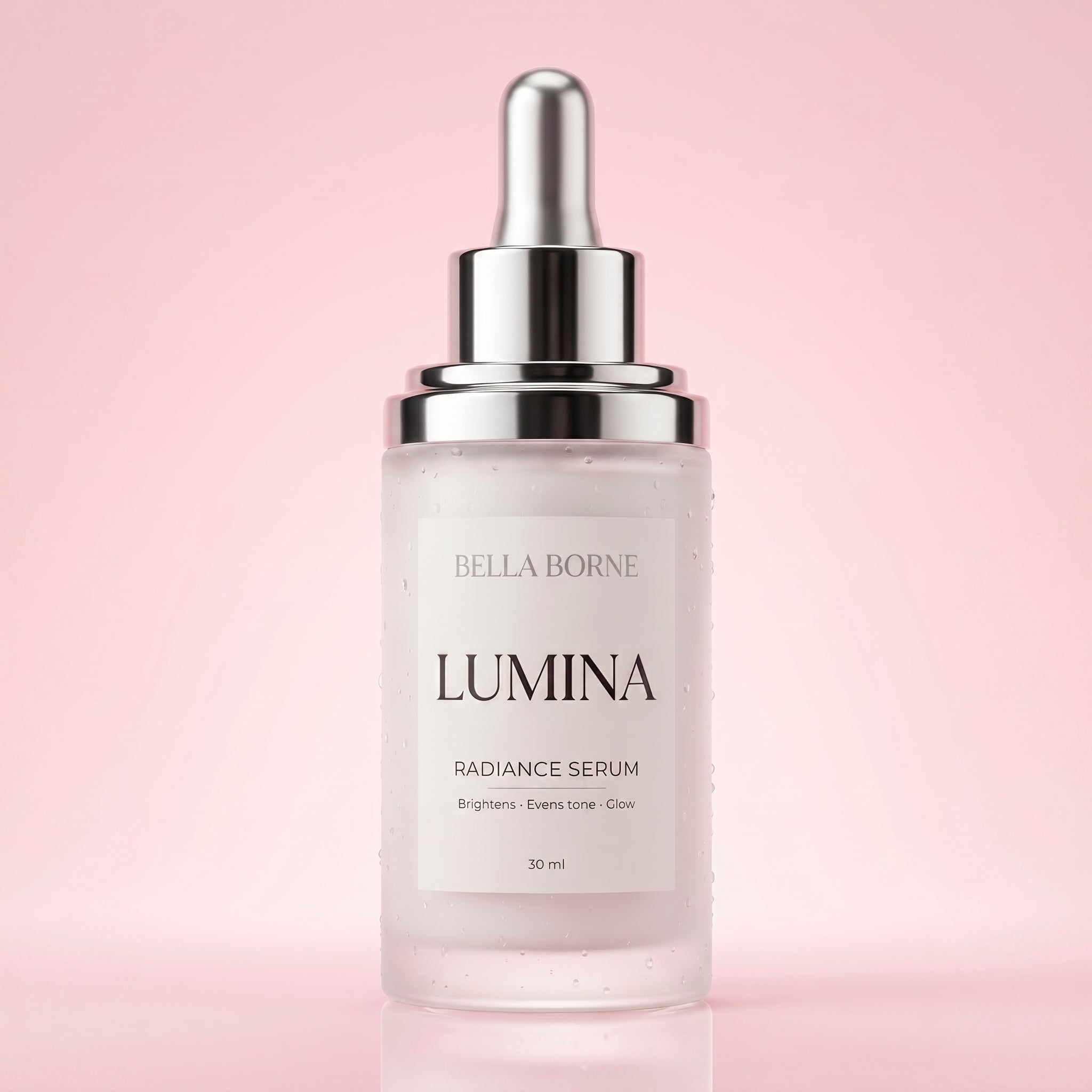 Bella Borne Lumina Radiance Serum bottle on a pink background