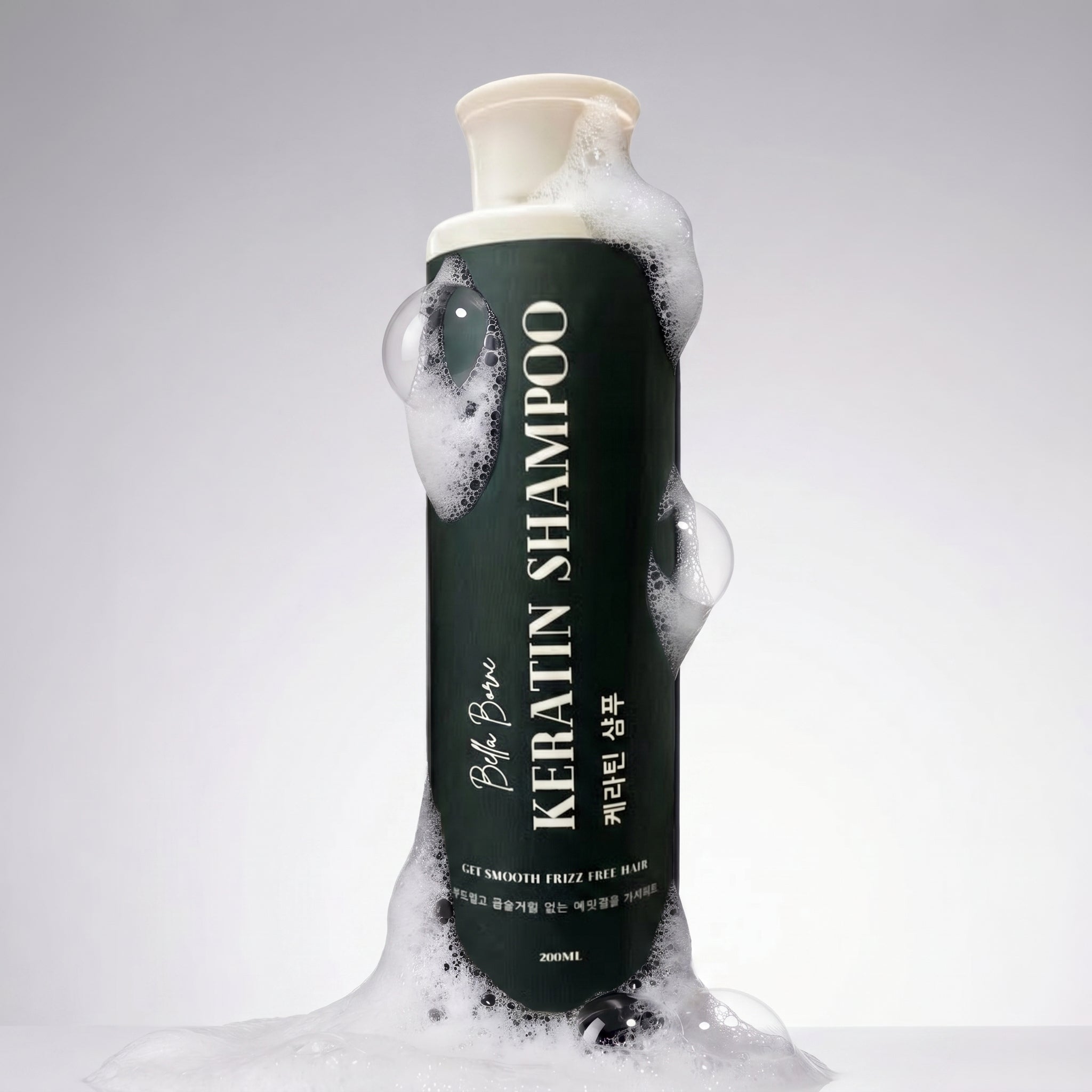 Bottle of Keratin Shampoo with foam on a gray background
