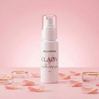 Bella Borne Clariv skincare product on a pink background with rose petals